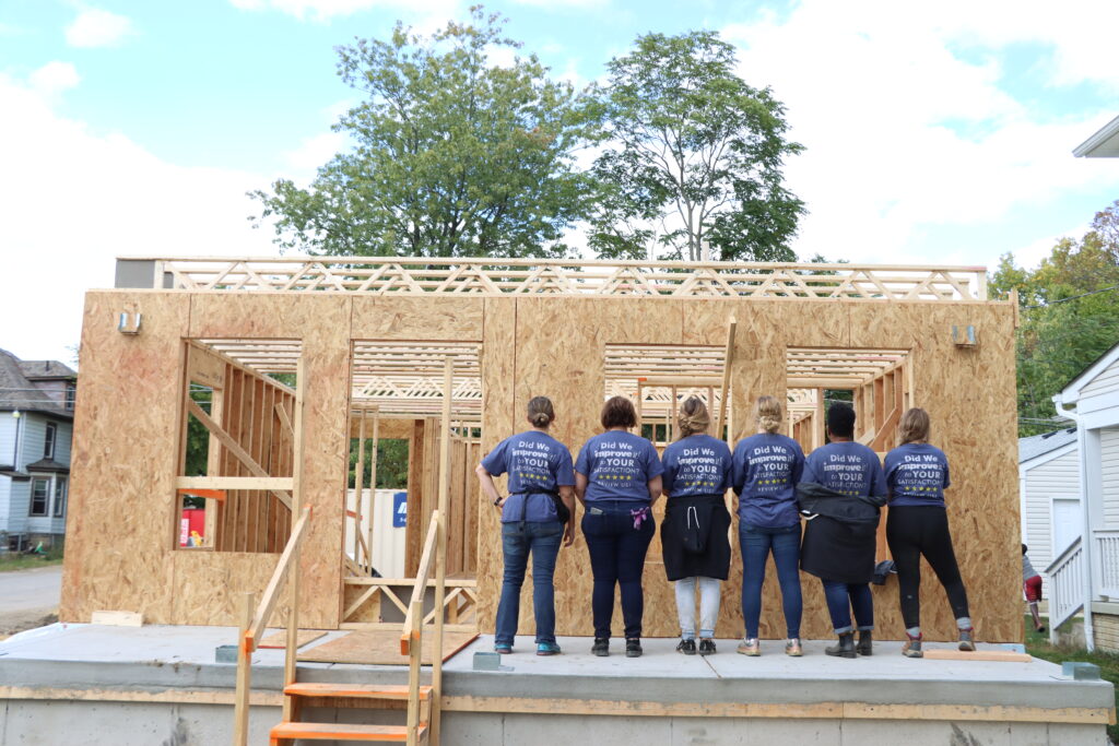 ImproveIt Team Trades Laptops for Hardhats on Habitat Volunteer Day