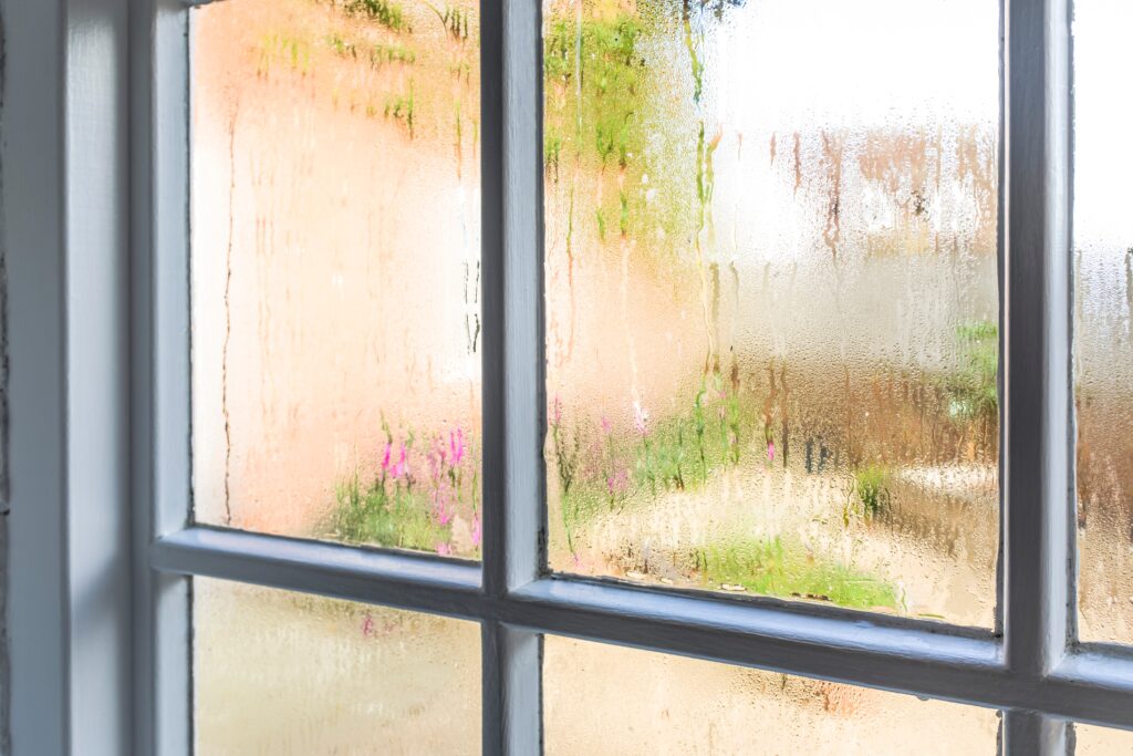 Window condensation on single pane window glass