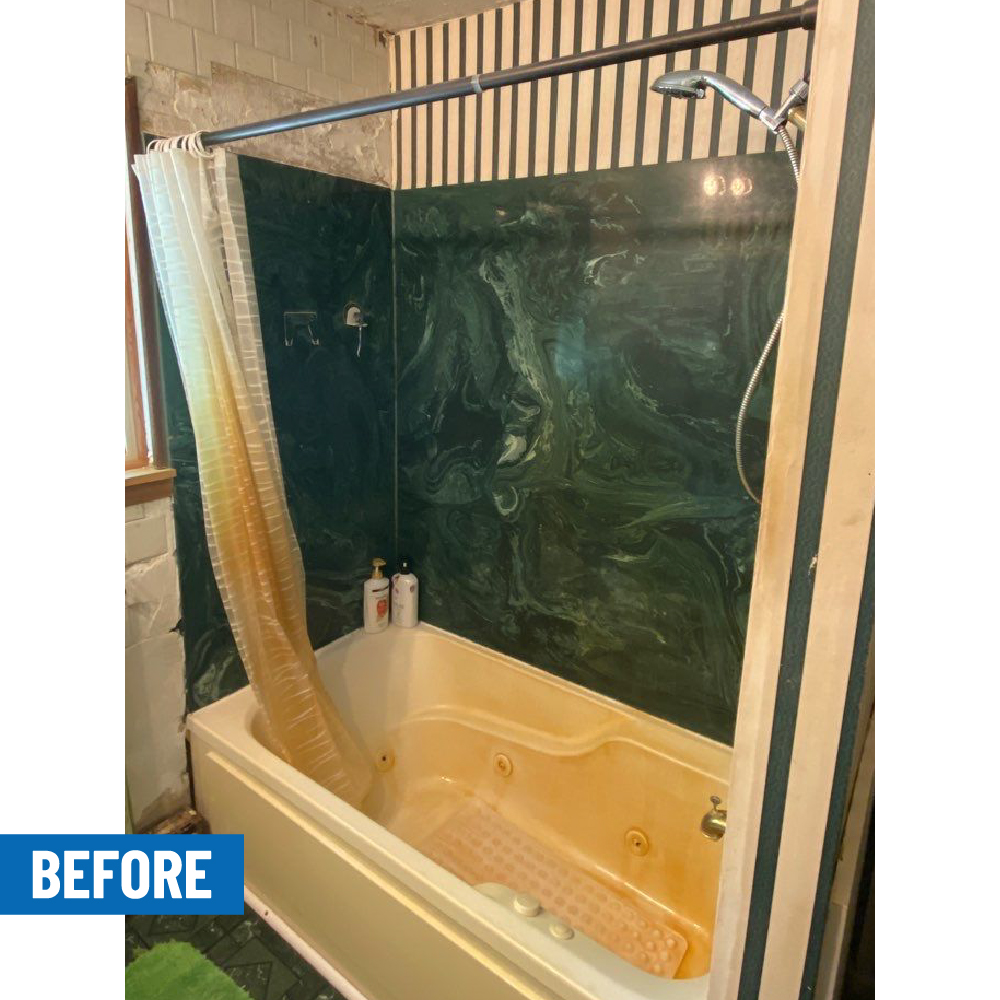 ugly bathroom tiles and green marble shower walls