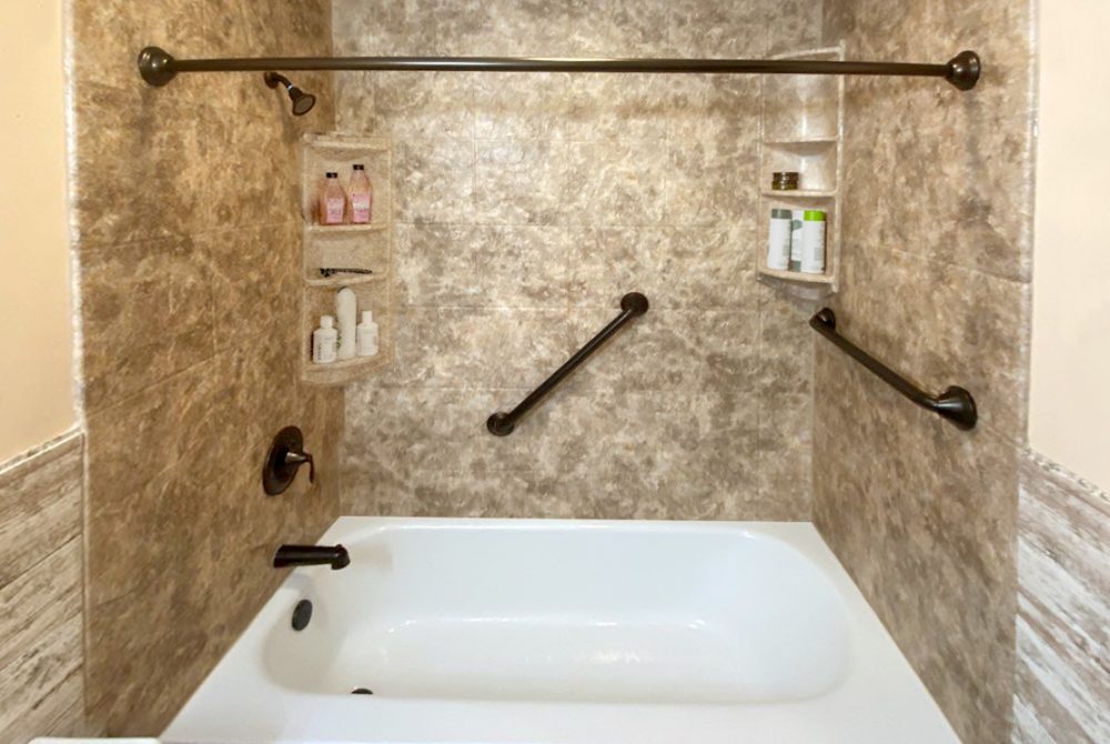 Tub-Shower Replacement, New Paris, OH features multieple grab bars popular in bathroom trends