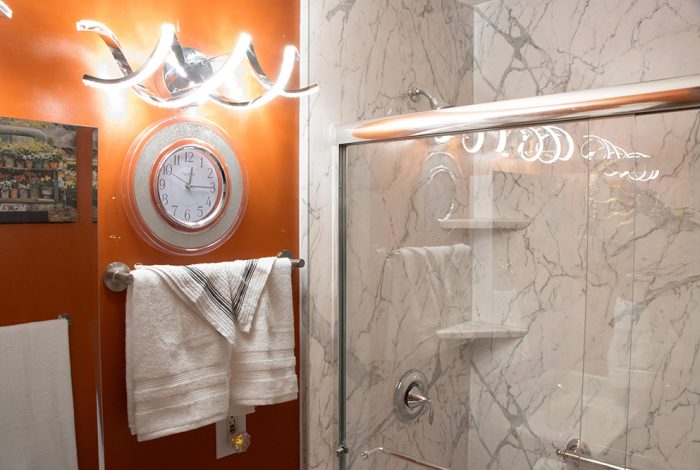 cool marble shower remodel columbus ohio bathroom with orange walls