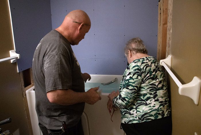 Customer consultation during Columbus walk in tub installation benefits of a walk-in tub