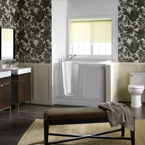 Walk-in tub with lighting solutions for a dark bathroom